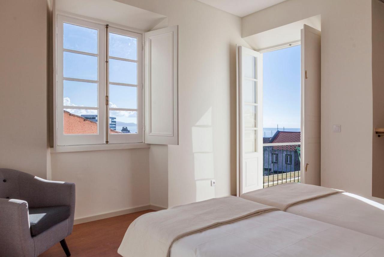 Quarto Duplo ou Twin com Casa de Banho Privativa